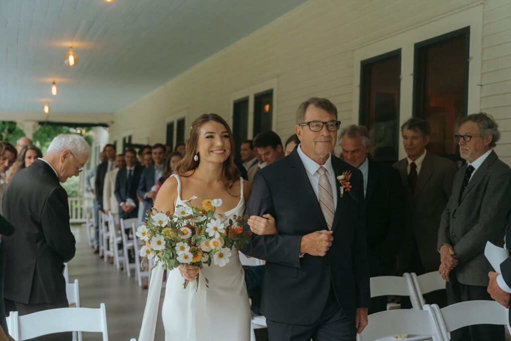 Bride and dad walking down the aisle