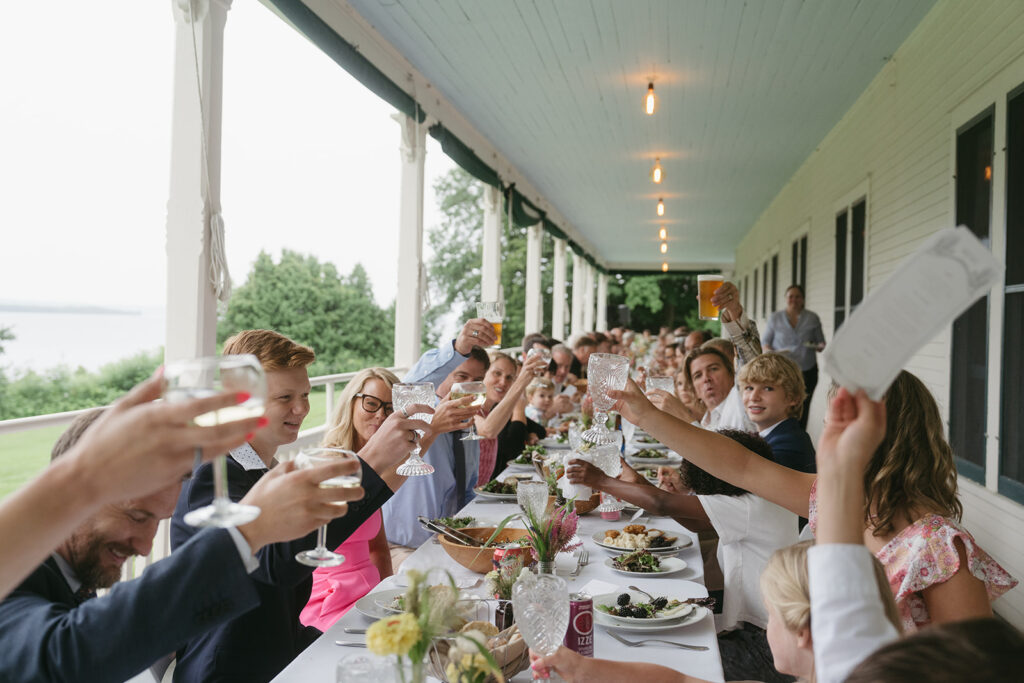 Bride and groom's family toasting