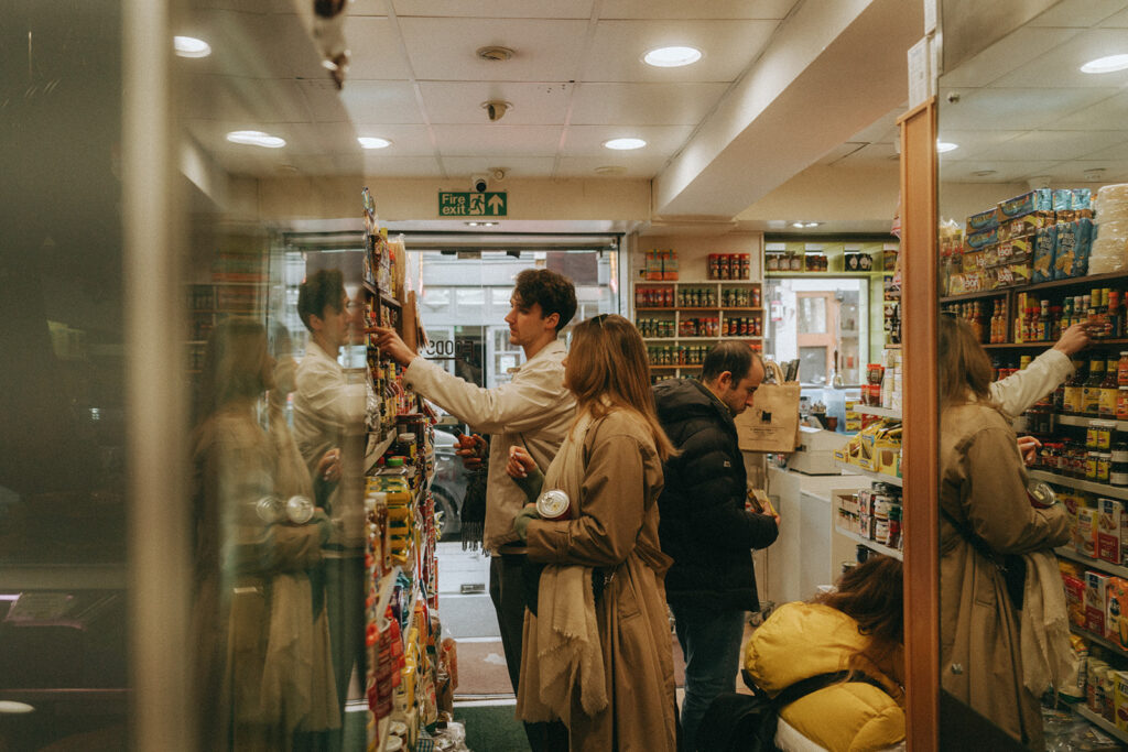 Couple in local grocery store in London.