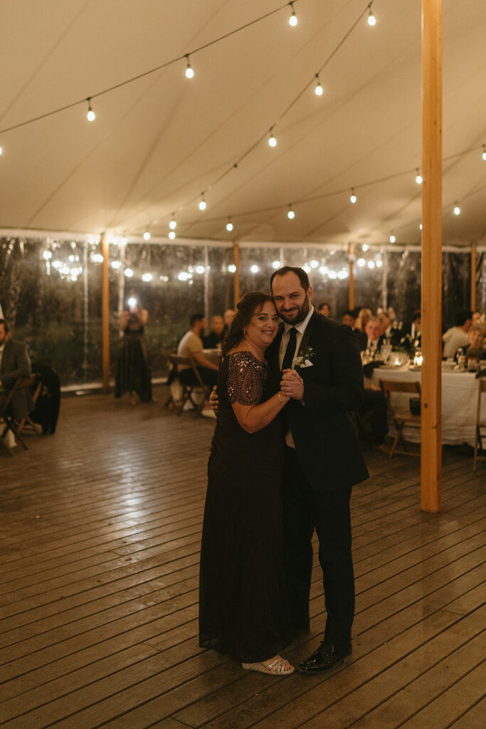 Groom and mother of the groom dancing 