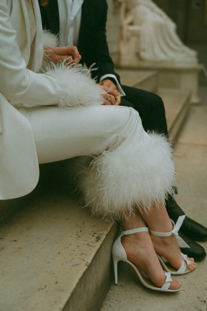 A white suit from Nadine Merabi, a perfect outfit for engagement photos