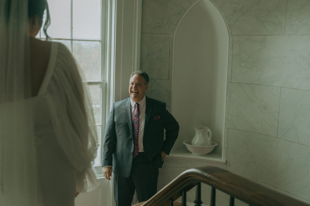 Bride's first look with her dad at the Peach Grove House before her Blooming Hill Farm wedding.