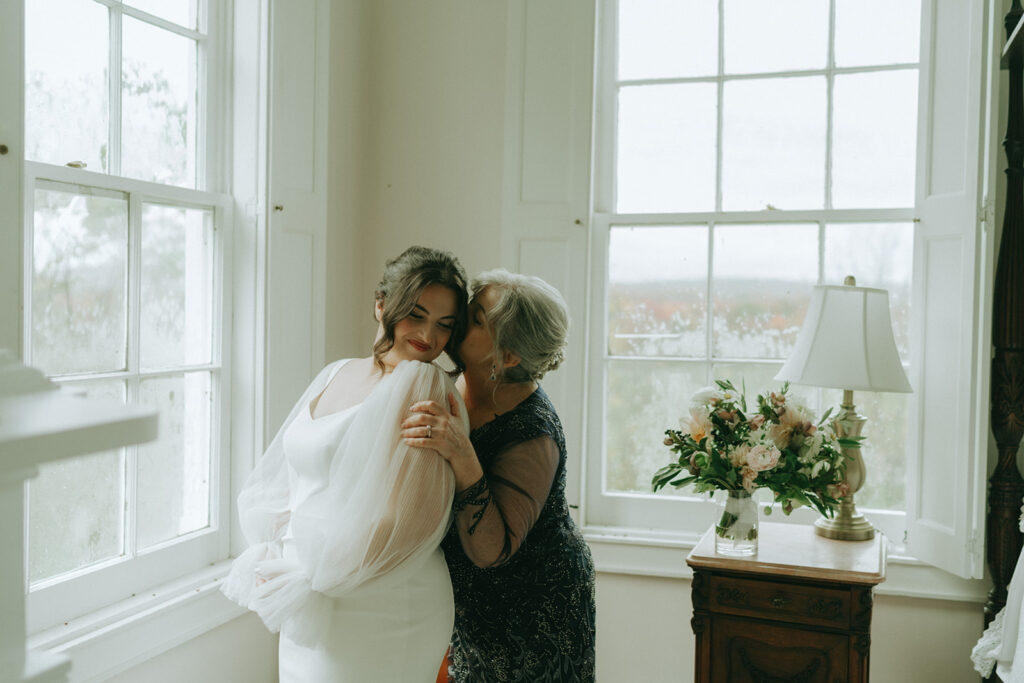 Bride getting ready at the Peach Grove House for a Blooming Hill Farm wedding.