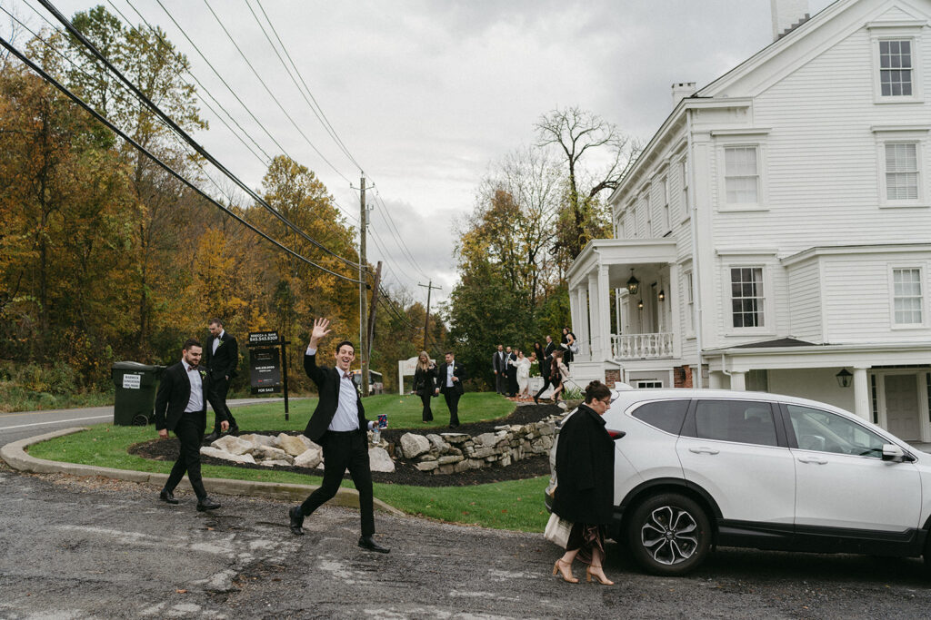 Family and friends leaving the Peach Grove House to head to the venue Blooming Hill Farm.