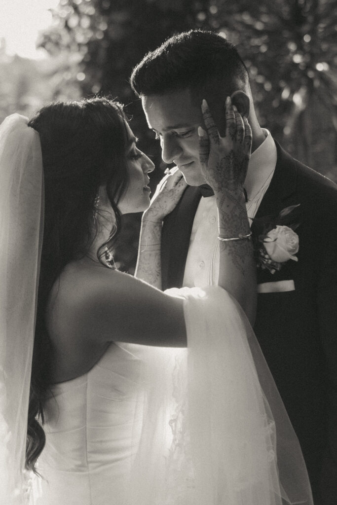 Bride and groom during golden hour at their Catholic Indian wedding at Crest Hollow Country Club, captured by Elsie Goodman Photography.