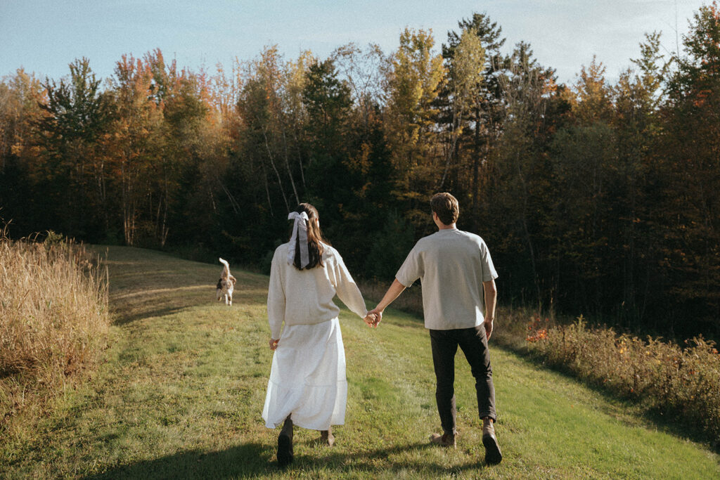Fall in Vermont photos with a couple, dog and golden light, by Elsie Goodman Photography.