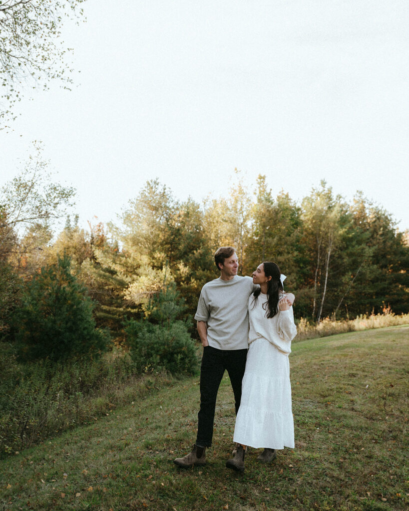 Vermont engagement photos couple smiling together, by Elsie Goodman Photography.