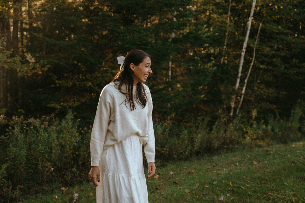 Autumn in Vermont solo bridal portrait smiling, by Elsie Goodman Photography.