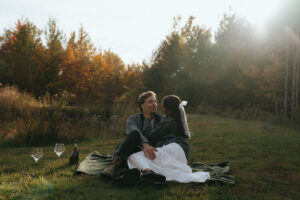 Vermont engagement photo with a golden hour picnic, by Elsie Goodman Photography.
