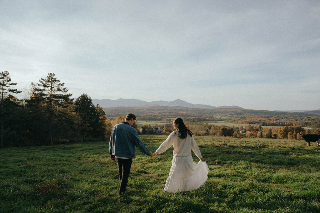 Vermont engagement photo ideas with fall walk and denim, by Elsie Goodman Photography.