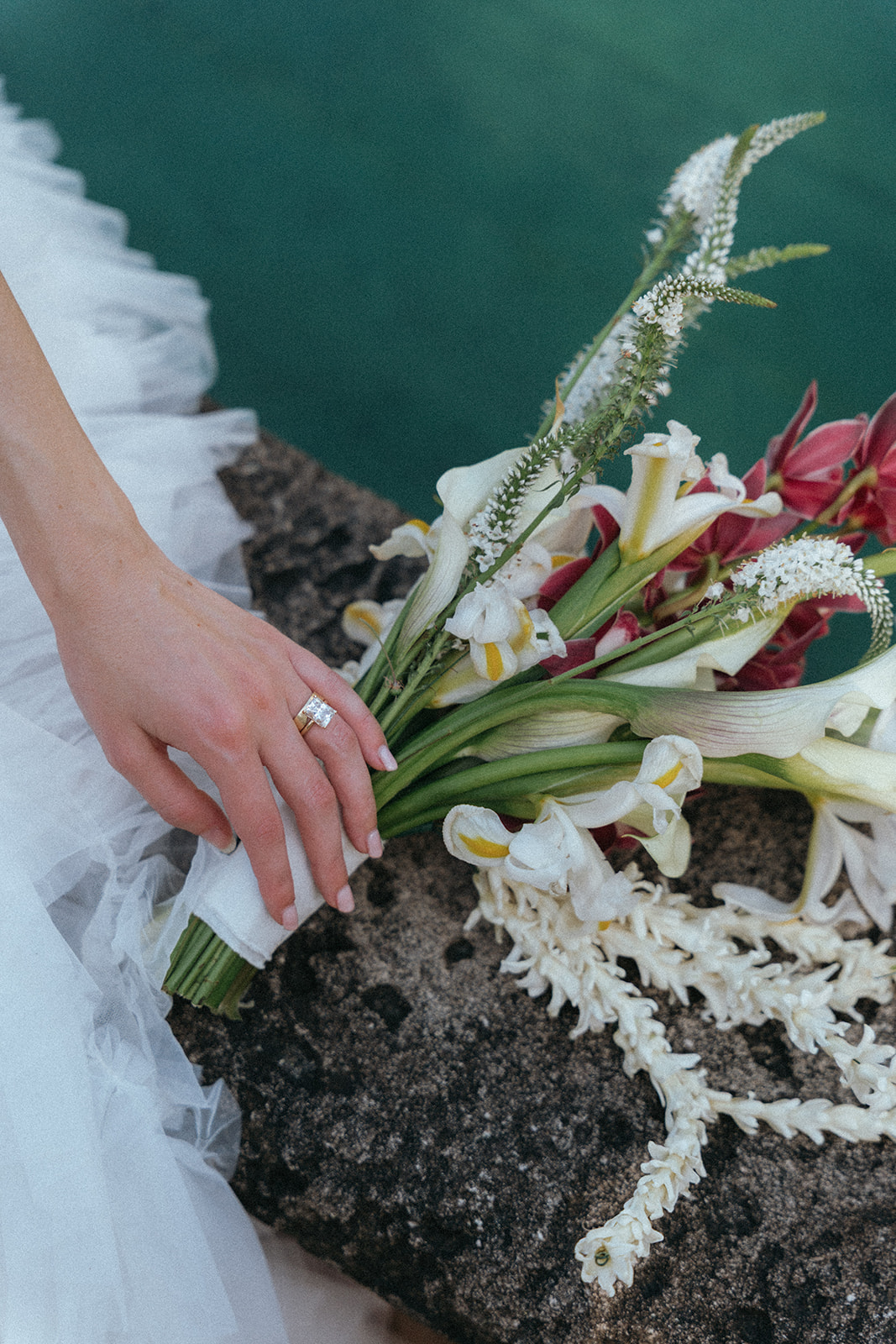 Viscaya Close up of a bride with her hand over her bouquet by Vizcaya Wedding Photographer Elsie Goodman.