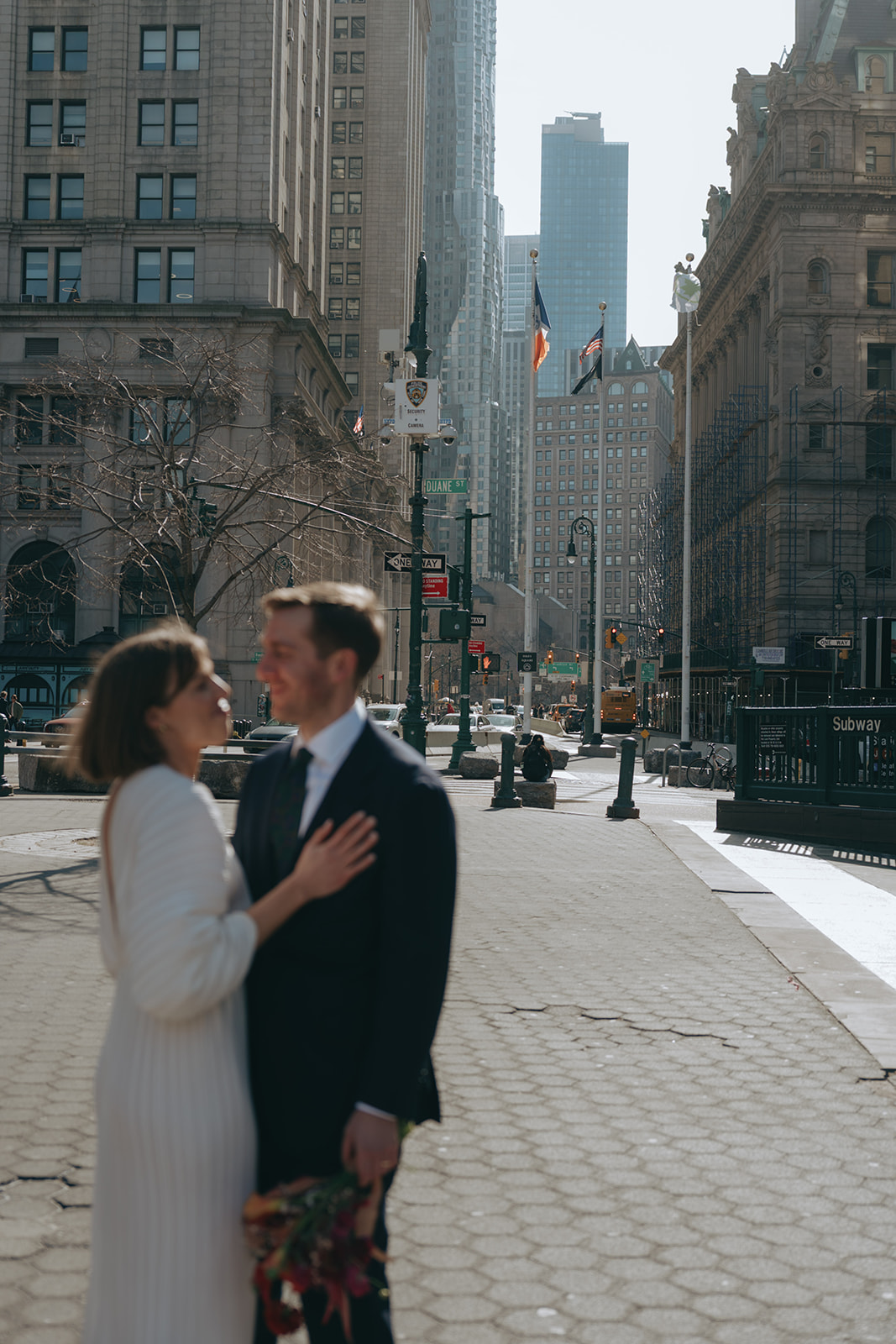 Rachel and Dave’s 2 day celebration Bride and groom looking lovingly at each other by NYC city hall wedding photographer Elsie Goodman.