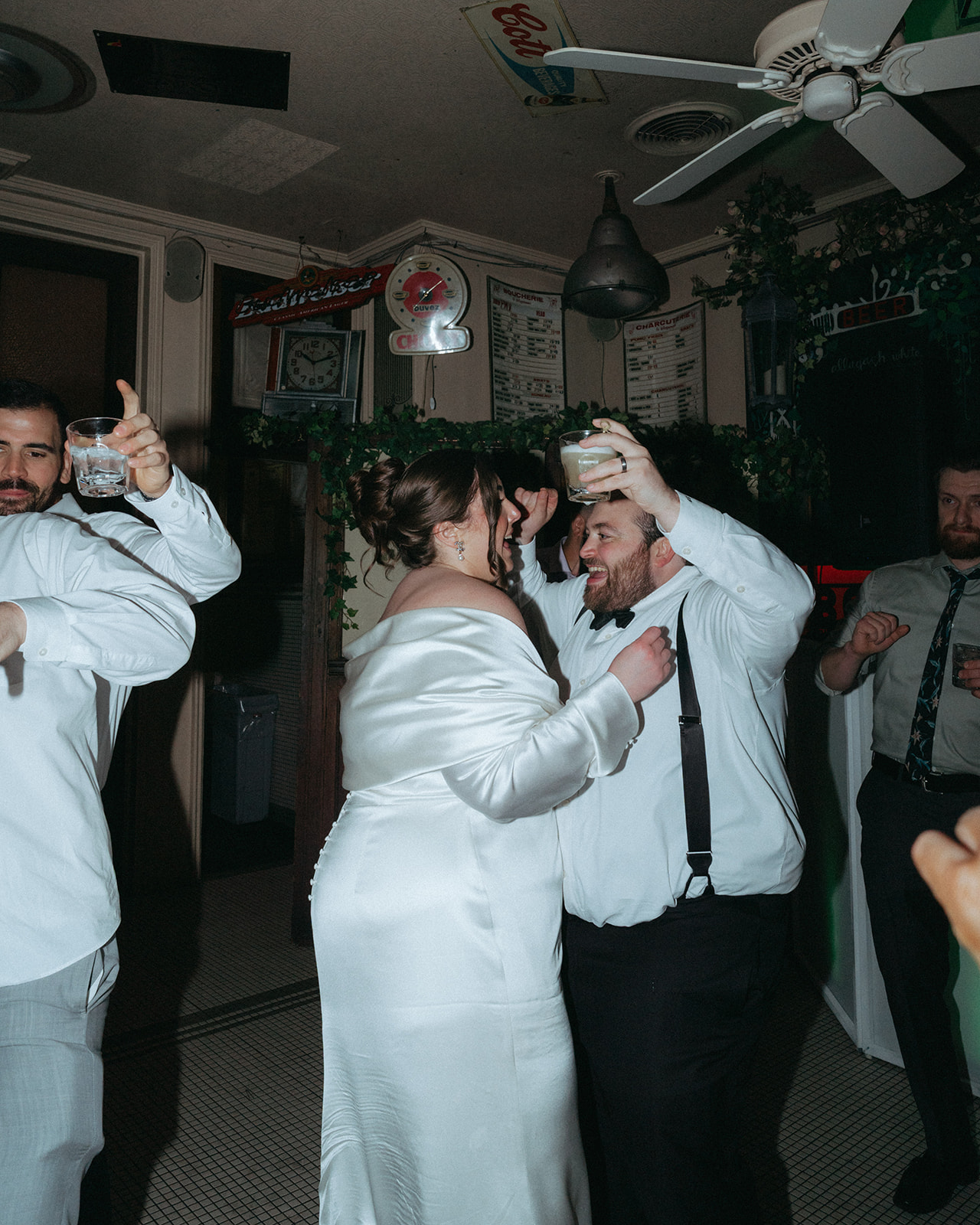 Madison + Dylan 620 Loft and Garden Wedding bride dancing with smiling loved one at wedding reception at Juliette’s in nyc, shot by elsie goodman, a destination and NYC wedding photographer