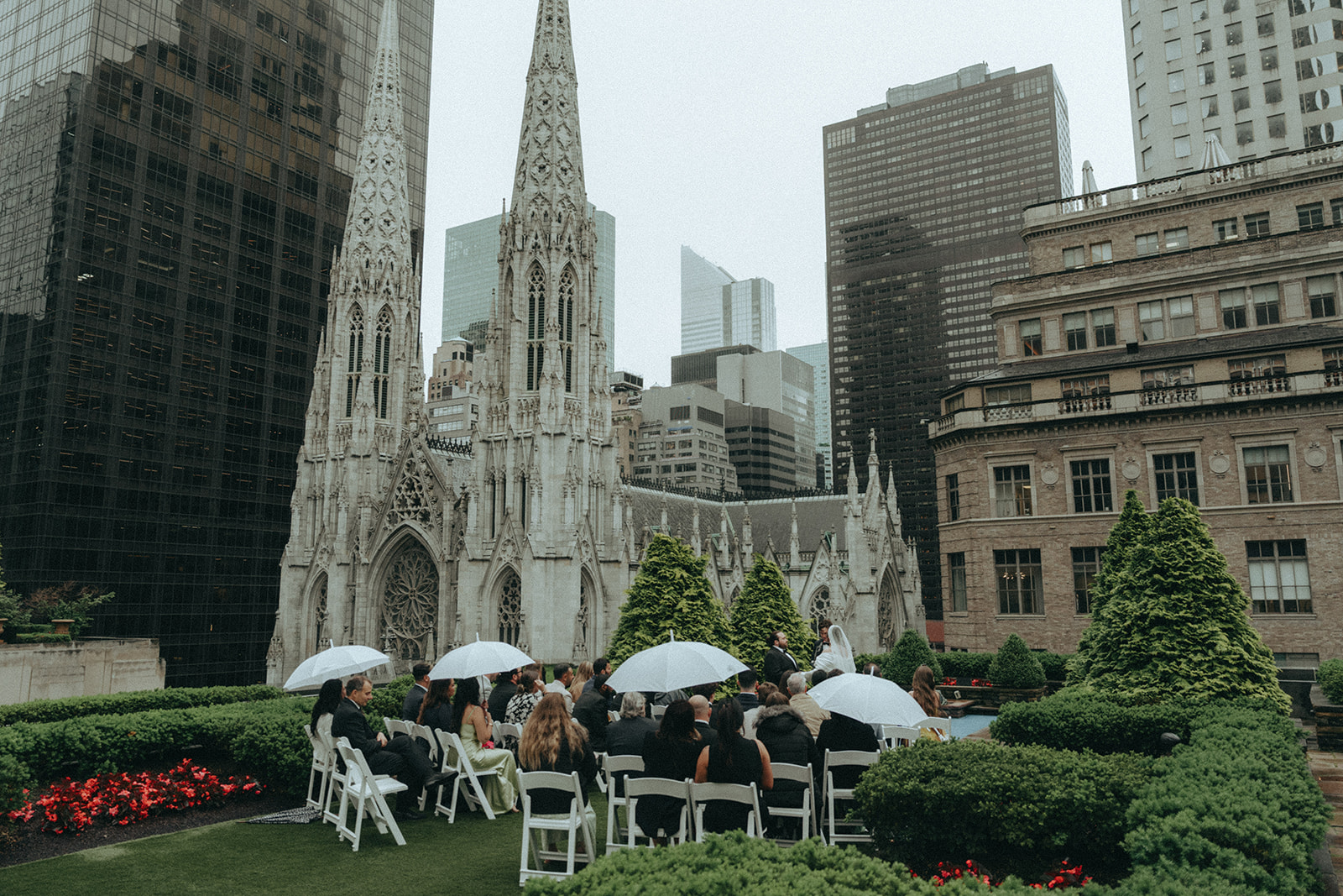 Madison + Dylan 620 Loft and Garden Wedding ceremony with saint patrick's cathedral in background at 620 loft & garden wedding, shot by elsie goodman, a destination and NYC wedding photographer