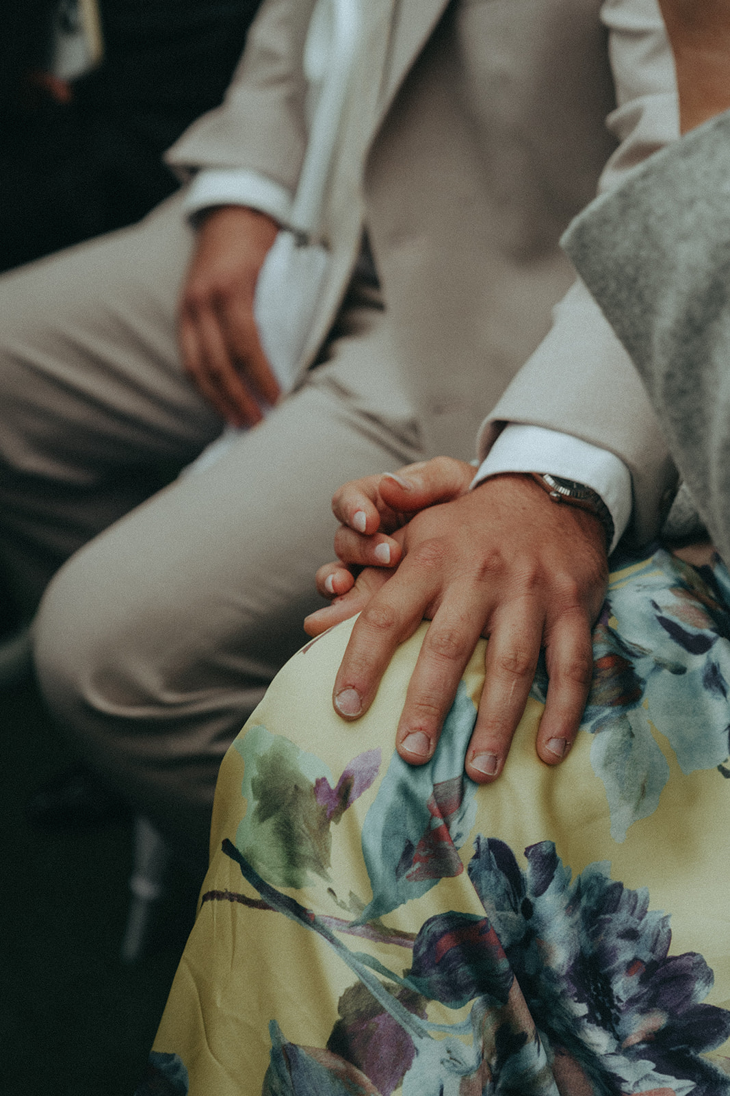Madison + Dylan 620 Loft and Garden Wedding close up of affectionate guest hands at 620 loft & garden wedding, shot by elsie goodman, a destination and NYC wedding photographer