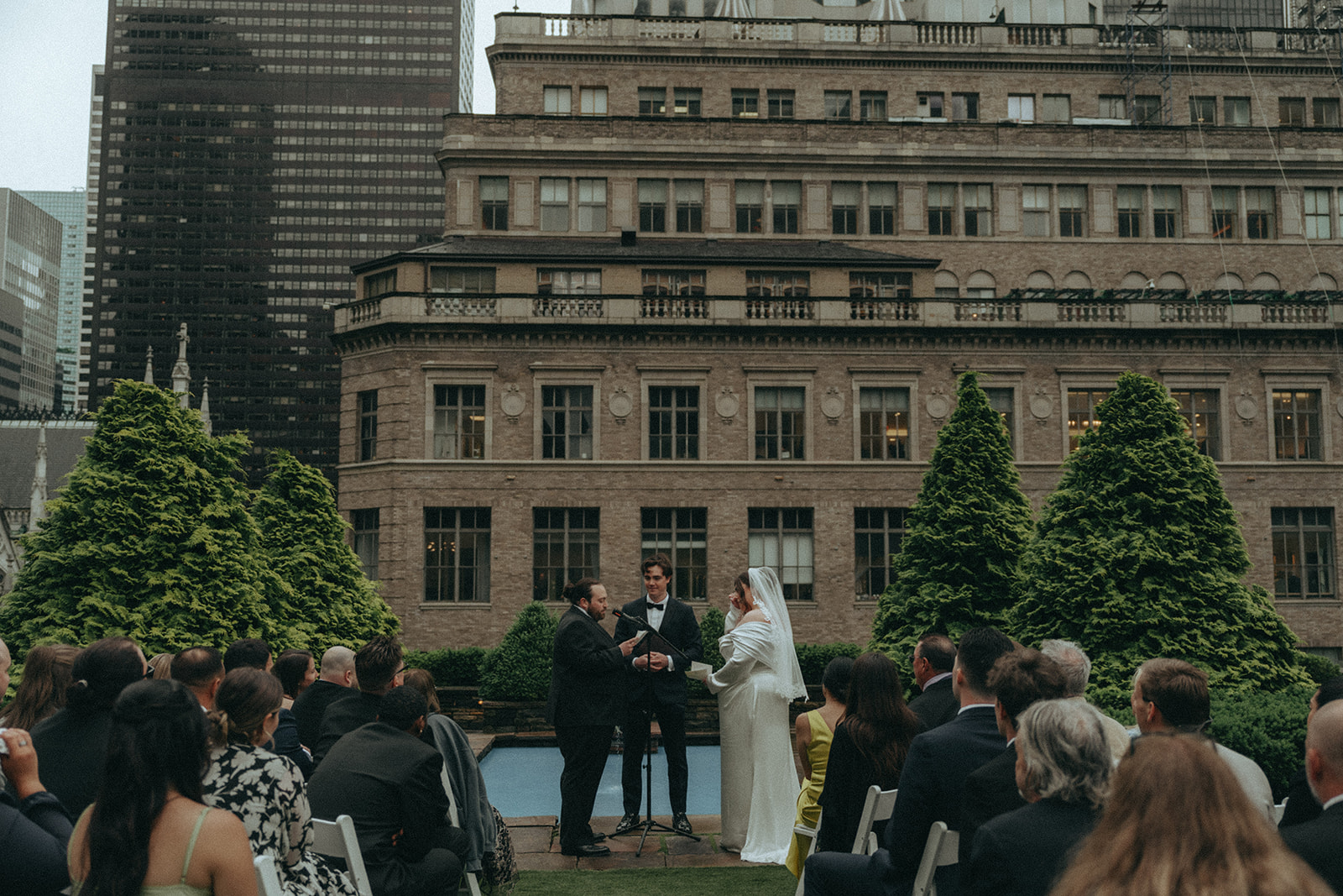 Madison + Dylan 620 Loft and Garden Wedding bride and groom exchanging vows at 620 loft & garden wedding, shot by elsie goodman, a destination and NYC wedding photographer