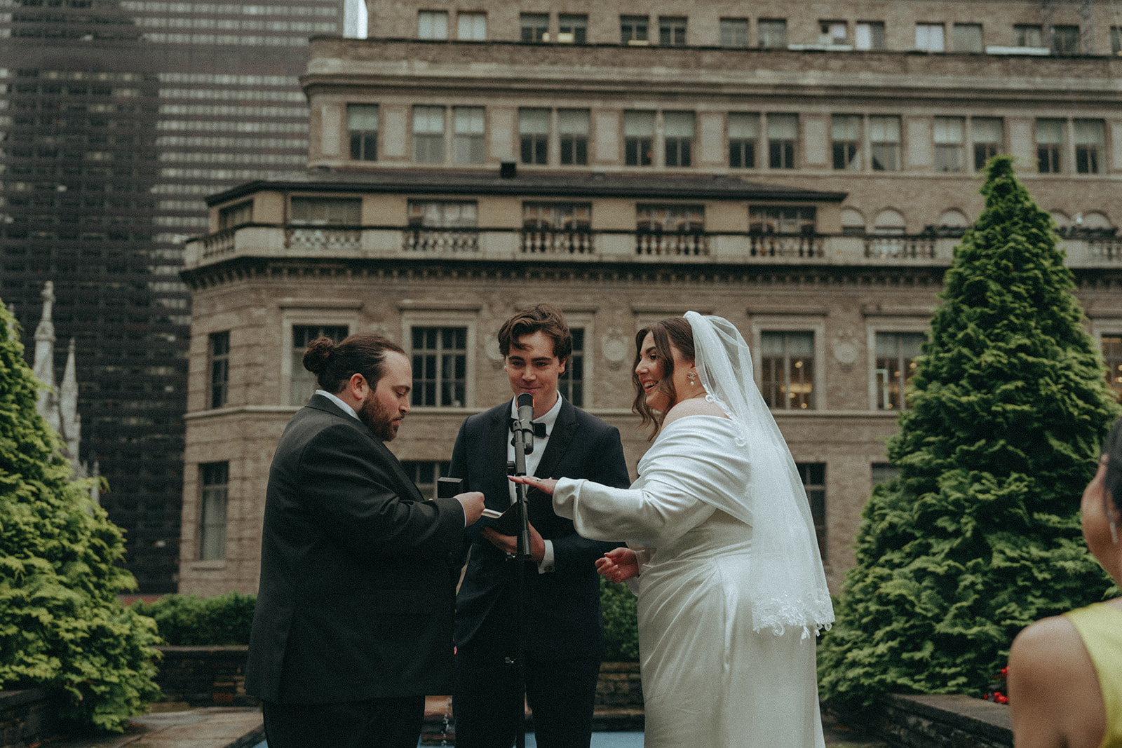 Madison + Dylan 620 Loft and Garden Wedding bride and groom exchanging rings at 620 loft & garden wedding, shot by elsie goodman, a destination and NYC wedding photographer