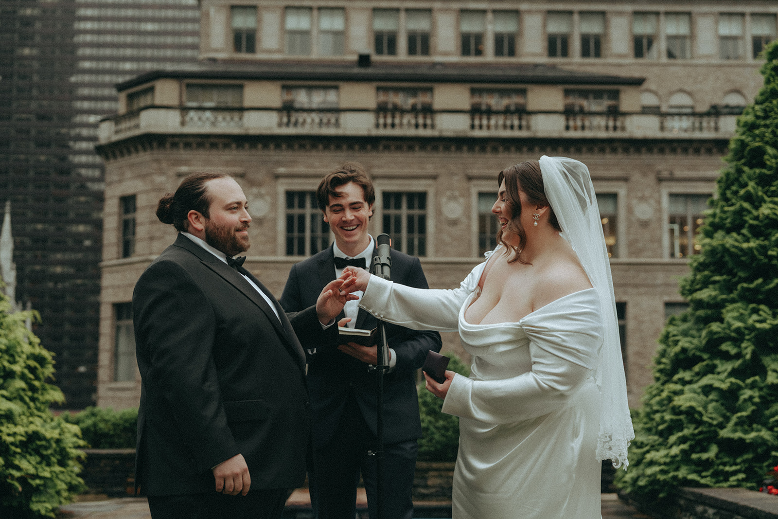 Madison + Dylan 620 Loft and Garden Wedding bride and groom exchanging rings at 620 loft & garden wedding, shot by elsie goodman, a destination and NYC wedding photographer