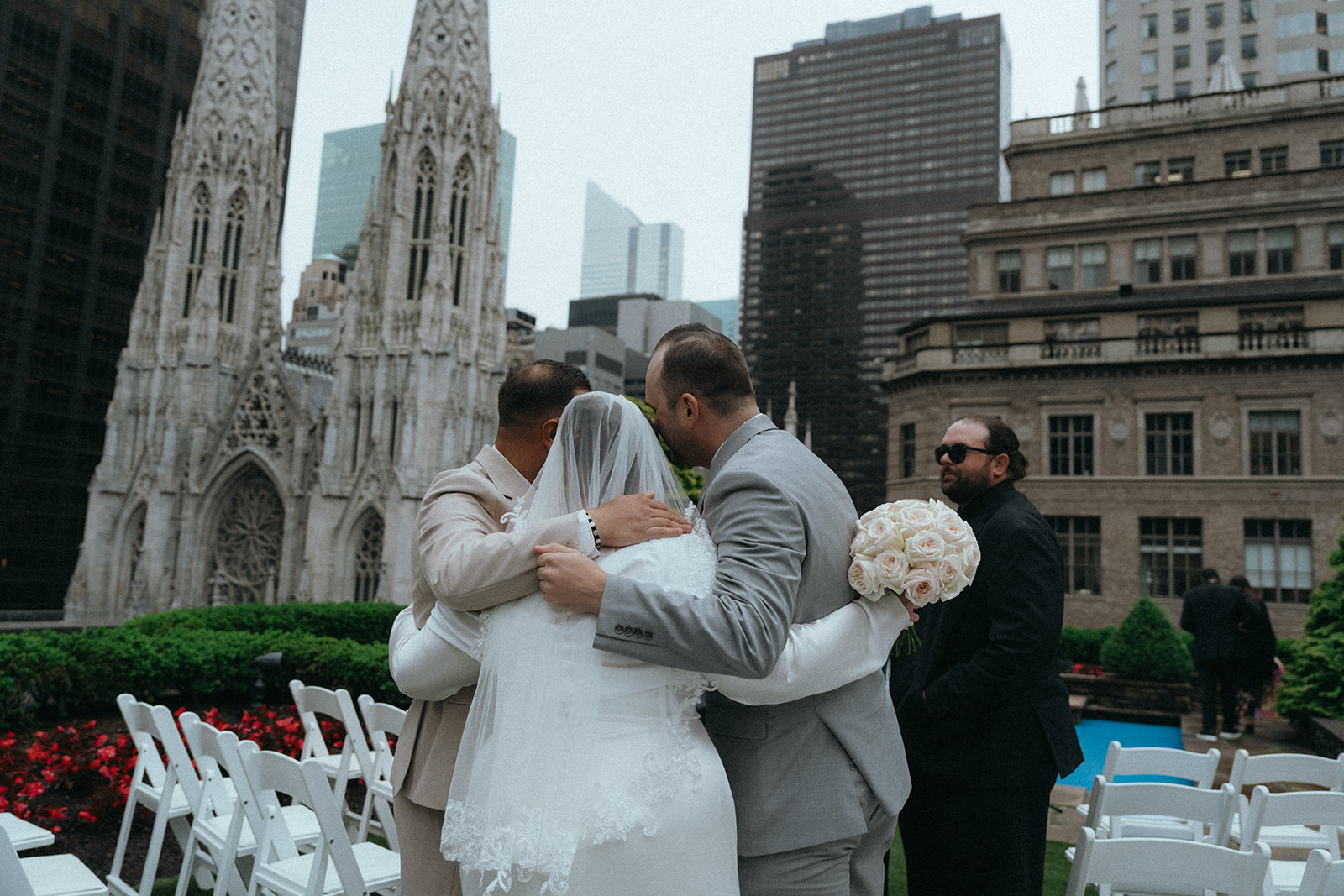 Madison + Dylan 620 Loft and Garden Wedding bride taking family portraits at 620 loft & garden wedding, shot by elsie goodman, a destination and NYC wedding photographer