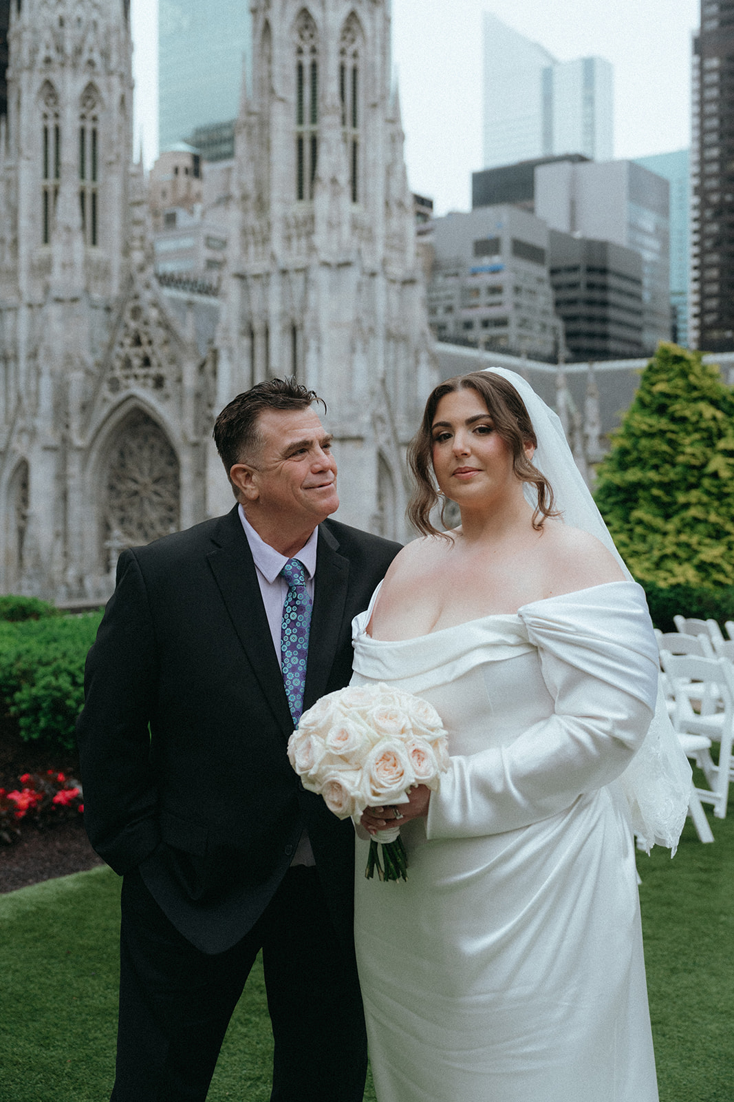 Madison + Dylan 620 Loft and Garden Wedding bride taking family portraits at 620 loft & garden wedding, shot by elsie goodman, a destination and NYC wedding photographer