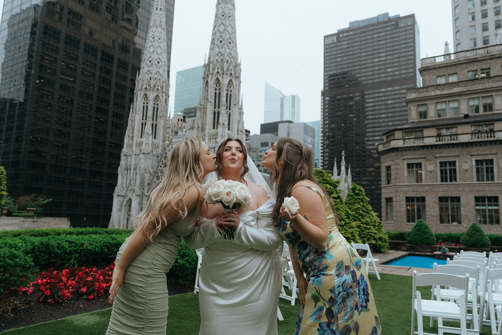 Madison + Dylan 620 Loft and Garden Wedding bride posing with her friends at 620 loft & garden wedding, shot by elsie goodman, a destination and NYC wedding photographer
