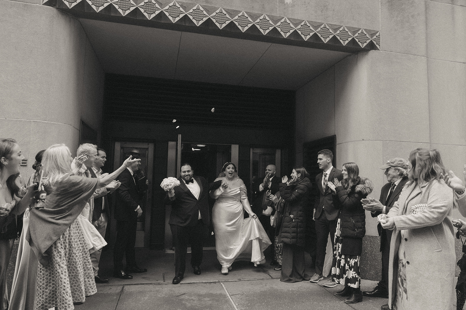 Madison + Dylan 620 Loft and Garden Wedding bride and grooms grand exit after 620 loft & garden wedding, shot by elsie goodman, a destination and NYC wedding photographer