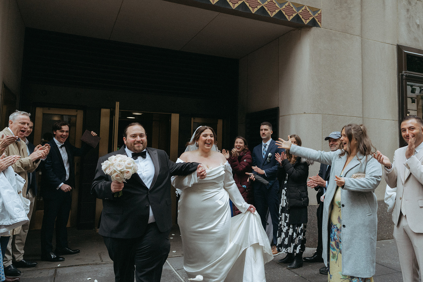 Madison + Dylan 620 Loft and Garden Wedding bride and grooms grand exit after 620 loft & garden wedding, shot by elsie goodman, a destination and NYC wedding photographer