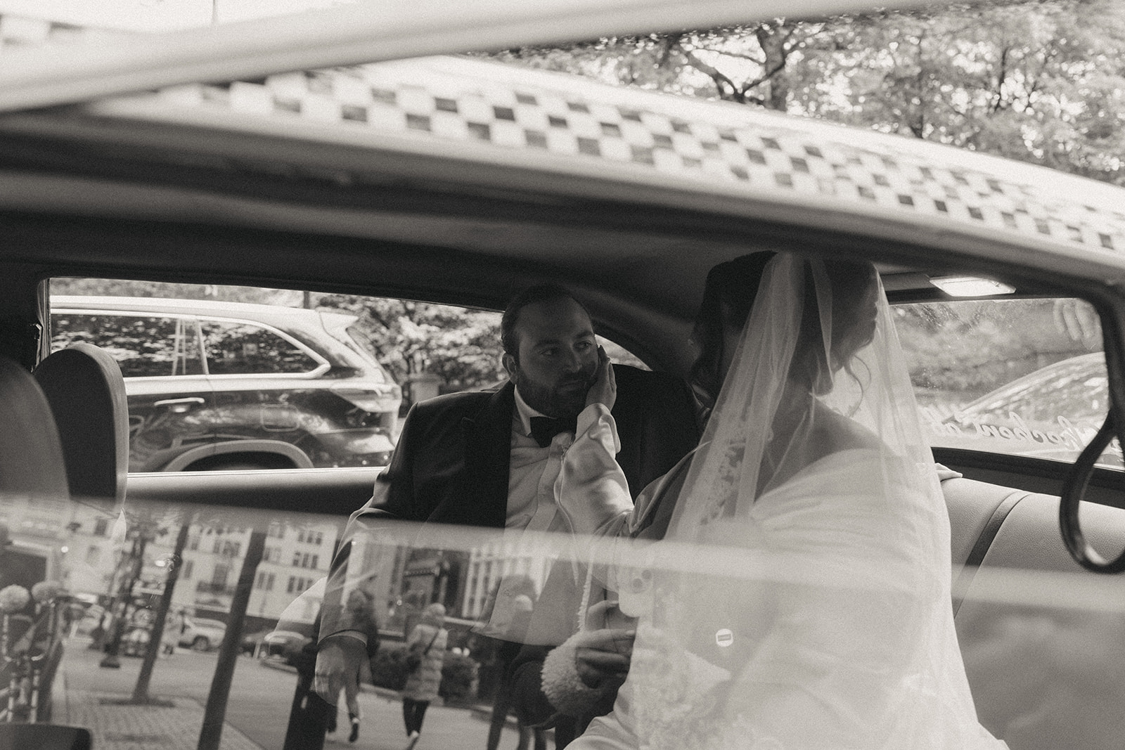 Madison + Dylan 620 Loft and Garden Wedding bride and groom sitting in vintage taxi after 620 loft & garden wedding, shot by elsie goodman, a destination and NYC wedding photographer