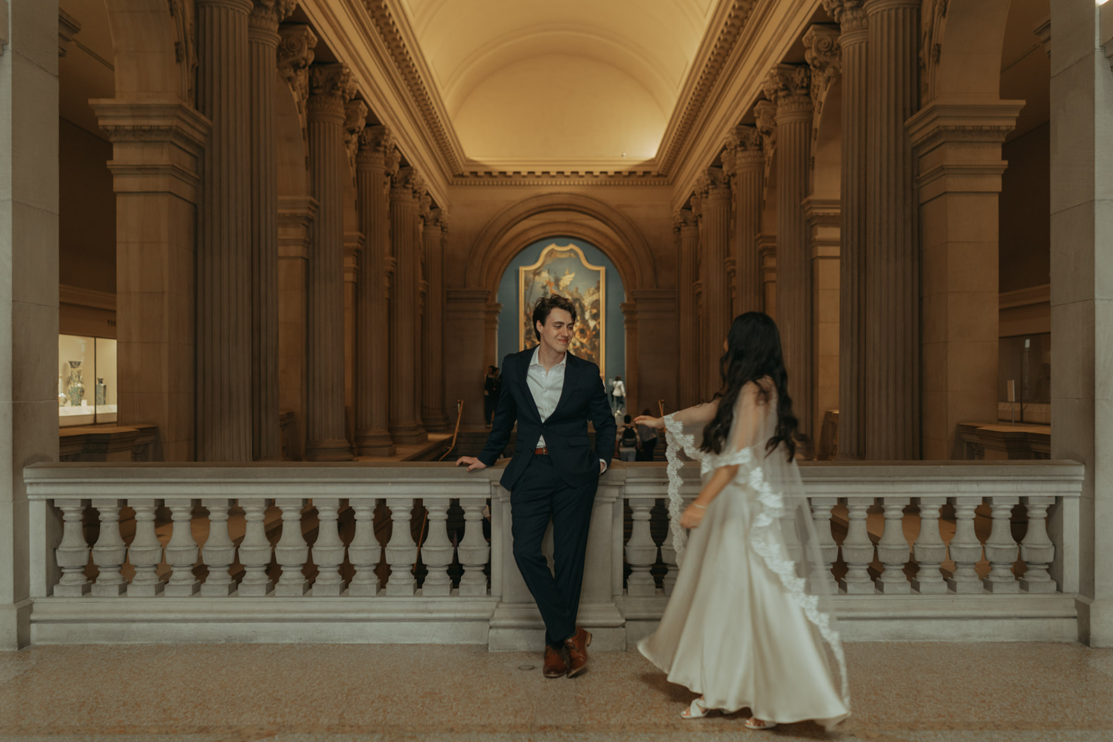 Alex + Bardo NYC Elopement Photos bride walking in front of groom at the Met for elopement photos, shot by elsie goodman, a destination, wedding and NYC elopement photographer