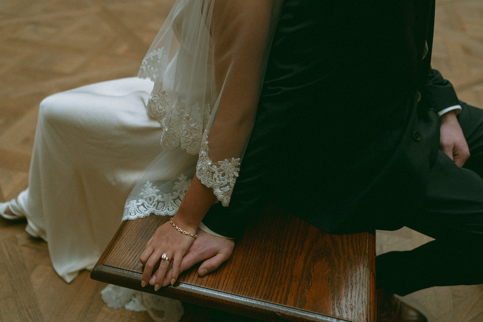 Alex + Bardo NYC Elopement Photos bride and groom's hands on bench at the Met for elopement photos, shot by elsie goodman, a destination, wedding and NYC elopement photographer