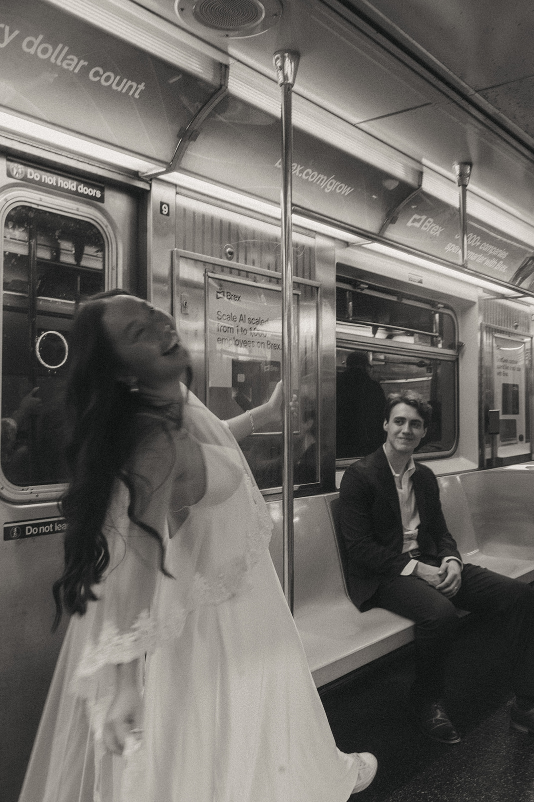 Alex + Bardo NYC Elopement Photos bride and groom riding nyc subway to city hall elopement, shot by elsie goodman, a destination, wedding and NYC elopement photographer