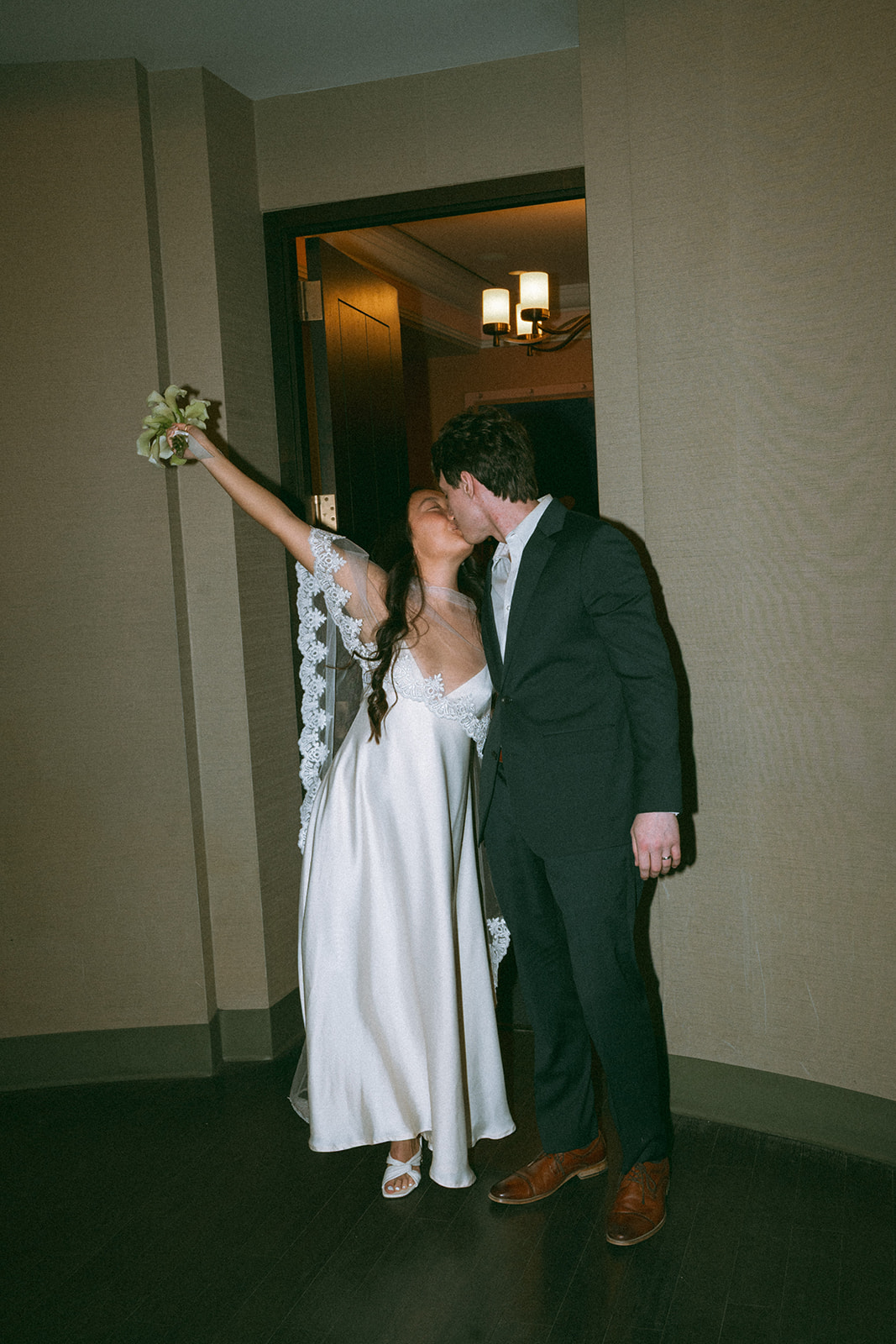 Alex + Bardo NYC Elopement Photos bride and groom kissing after eloping at nyc city hall, shot by elsie goodman, a destination, wedding and NYC elopement photographer