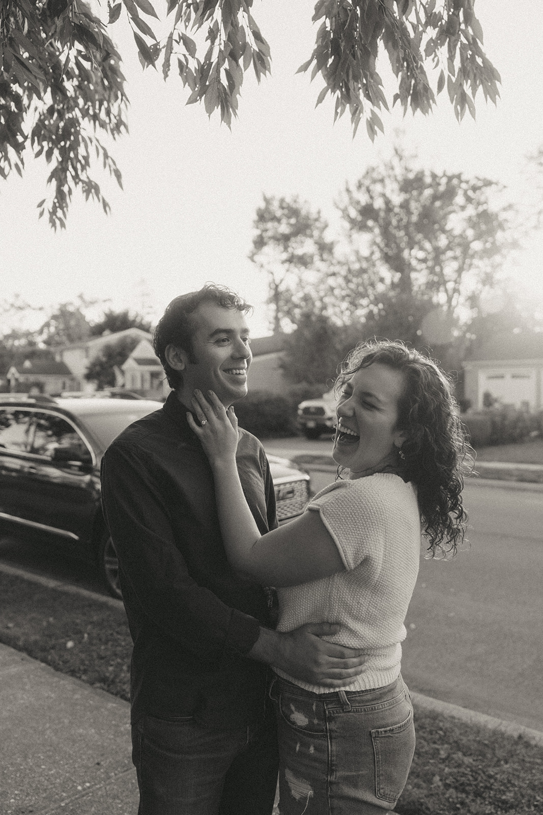 Couple laughing by wedding and couples photographer Elsie Goodman.