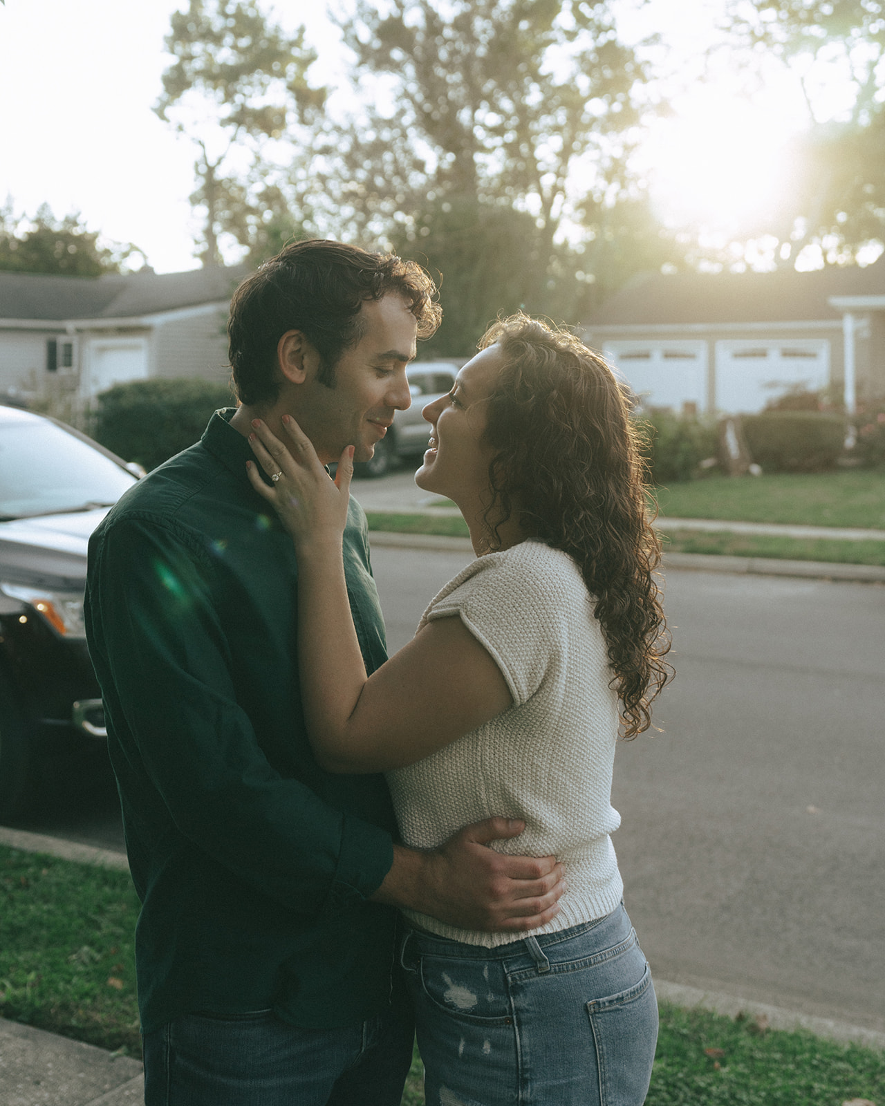 Couple leaning in for a kiss by wedding and couples photographer Elsie Goodman.