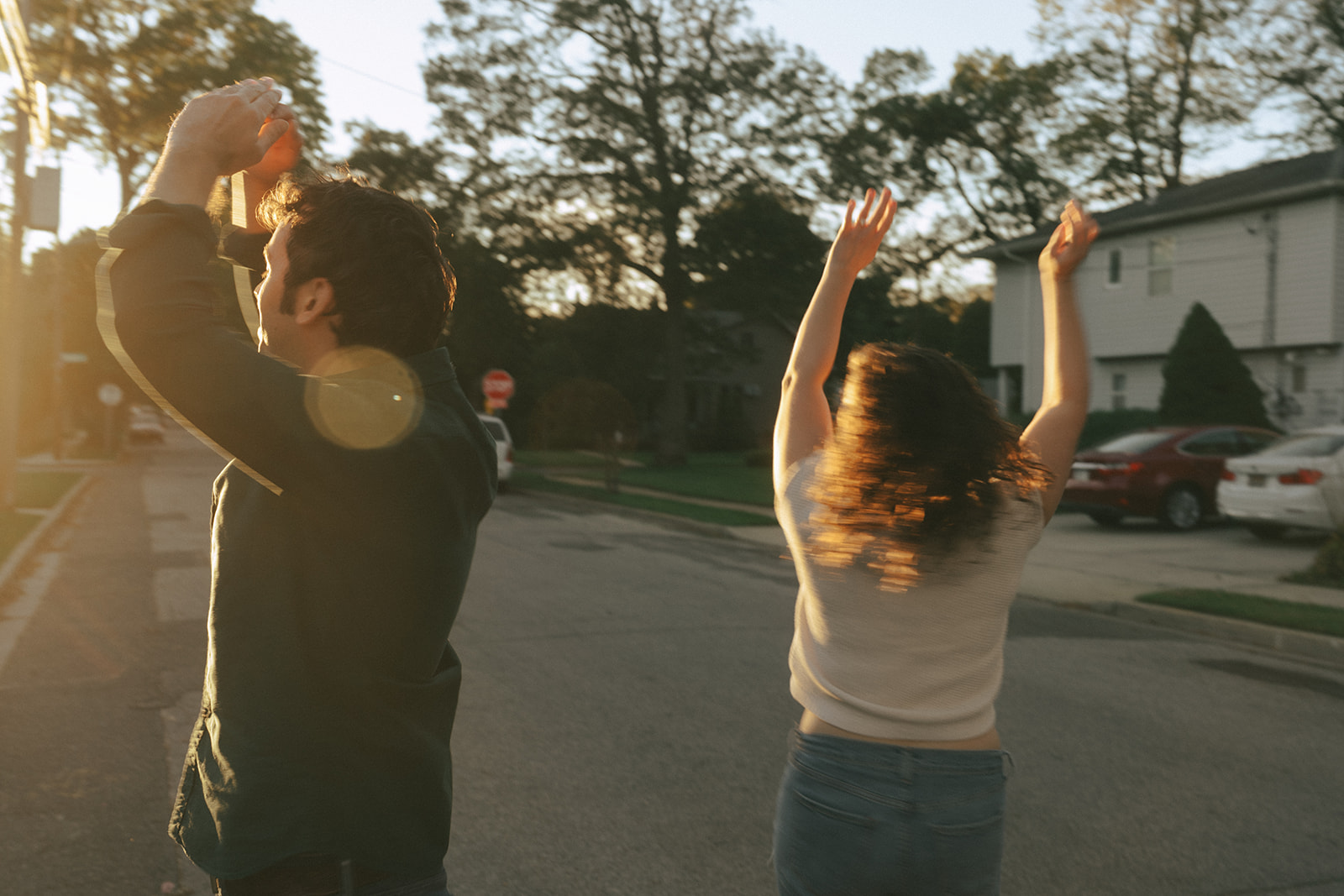 Couple dancing in the street during the golden hour by wedding and couples photographer Elsie Goodman.